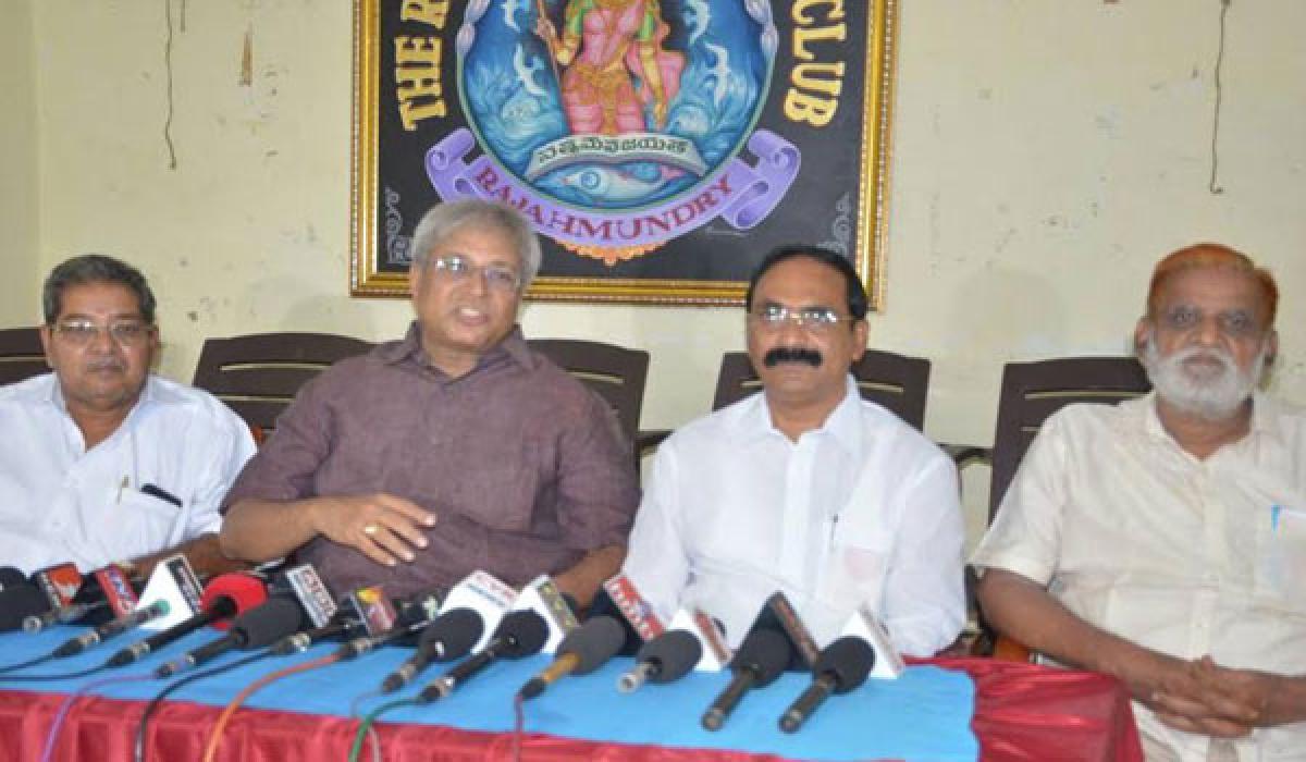 Former MP Vundavalli Arun Kumar (second from left) speaking at a press conference in Rajamahendravaram on Saturday