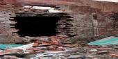 One dies in wall collapse