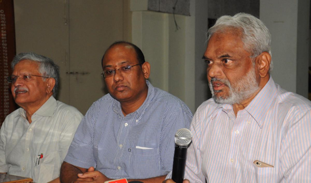 Andhra Pradesh Medical Council (APMC) Chairman Dr Y Raja Rao (frist from right) addressing a press conference in Vijayawada on Tuesday