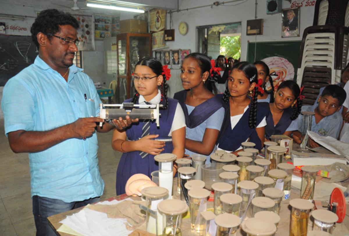 AKTP Municipal High School, Satyanarayanapuram has inadequate lab facilities. Students seen in the lab