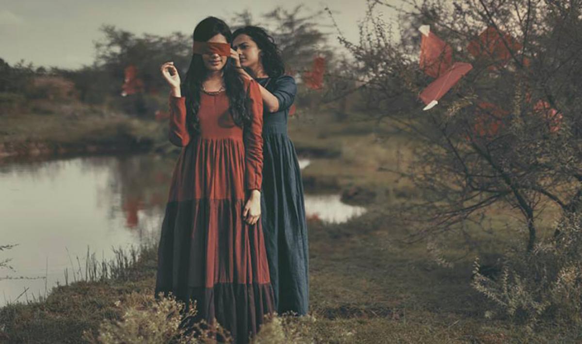 The cute little shrubs in the forest cast their reflection on the water forming buttery silhouettes; it was still early morning and the music of the birds floated in the air. Tiny fishes broke the surface of the water causing the water ripples to glimmer in the Sun's reflection. The girls smiled in their newfound comfort and decided to play a game of hide and seek...