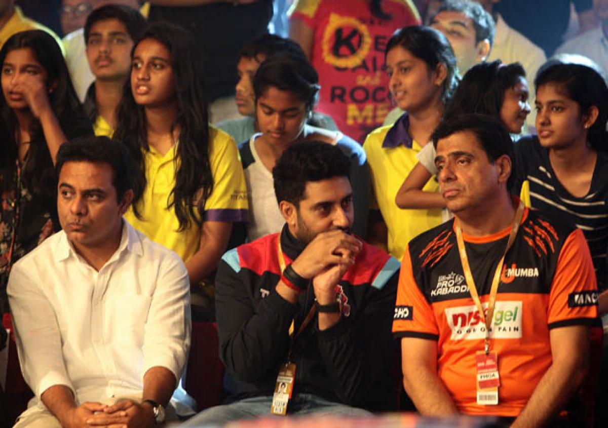 (From left) Information Technology Minister KT Rama Rao watches  Jaipur Pink Panthers and U Mumba match with Abhishek Bachchan (owner of Jaipur Pink Panthers) and Ronnie Screwvala (owner of U Mumba) in the Pro Kabaddi League in Hyderabad on Friday. Photo: Saleem