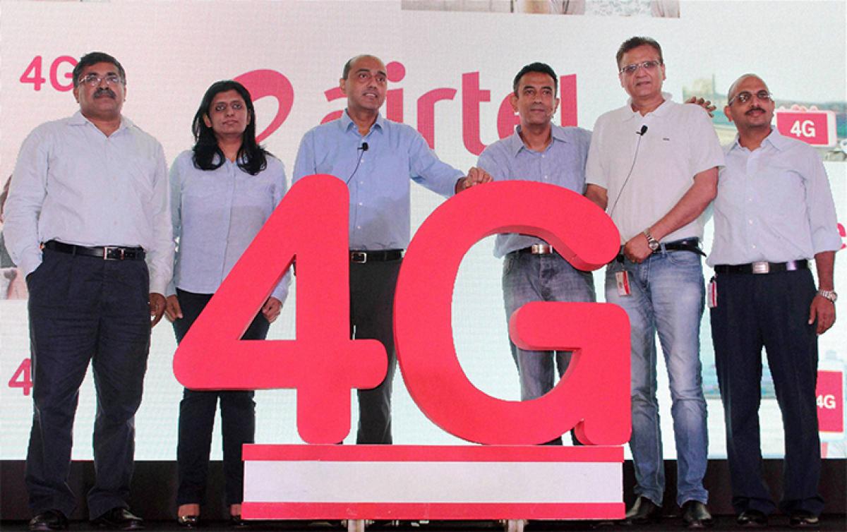 Gopal Vittal, MD & CEO, Bharti Airtel along with other dignitaries, announcing the commercial launch of Airtel 4G services, in Gurgaon on Thursday.