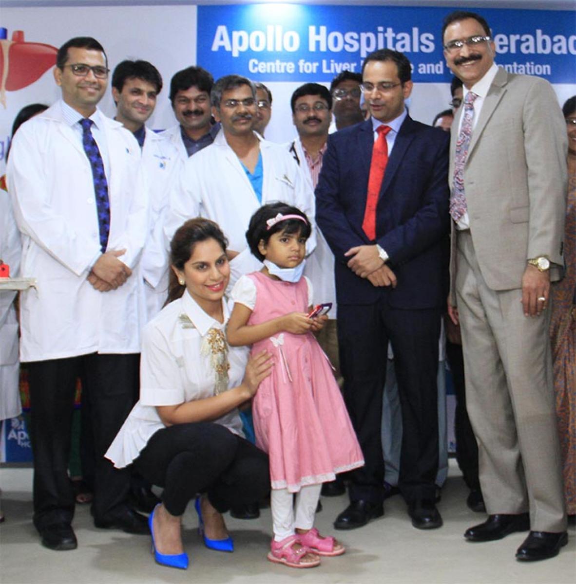 Upasna poses with Salama, who underwent the surgery. Also seen are the team of doctors who performed the surgery 