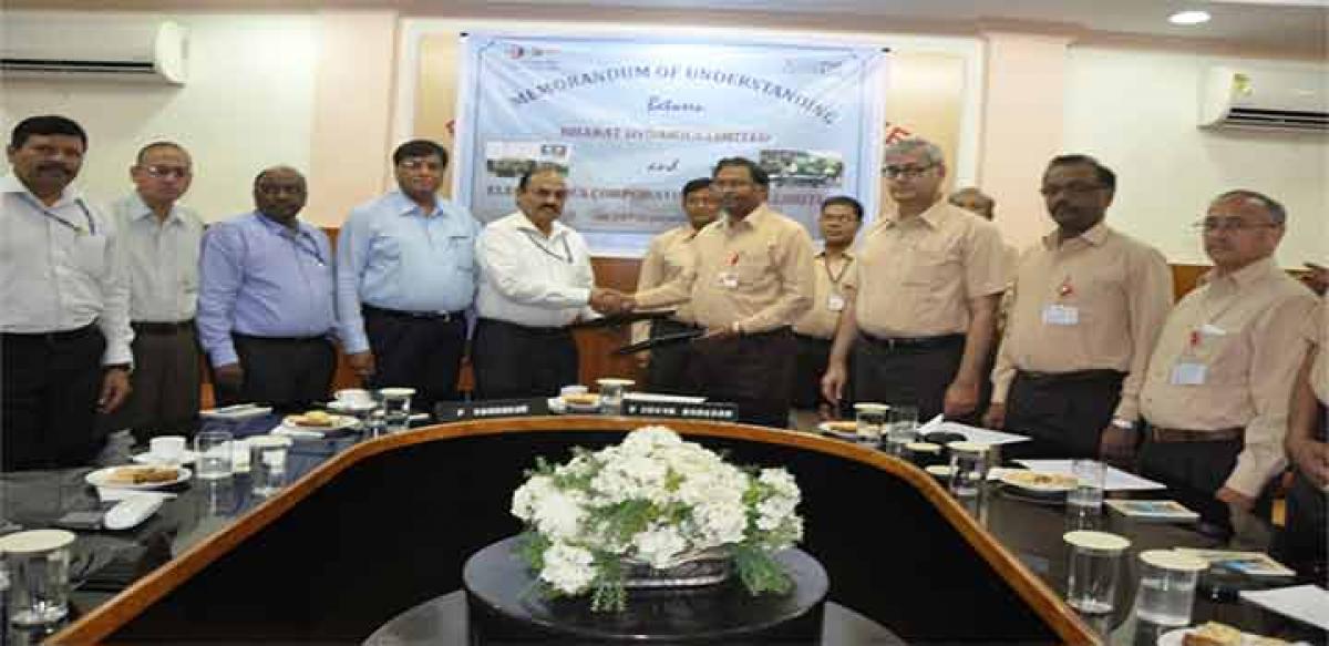 CMD, BDL, V Udaya Bhaskar and CMD, ECIL, P Sudhakar exchanging MoU documents at BDL