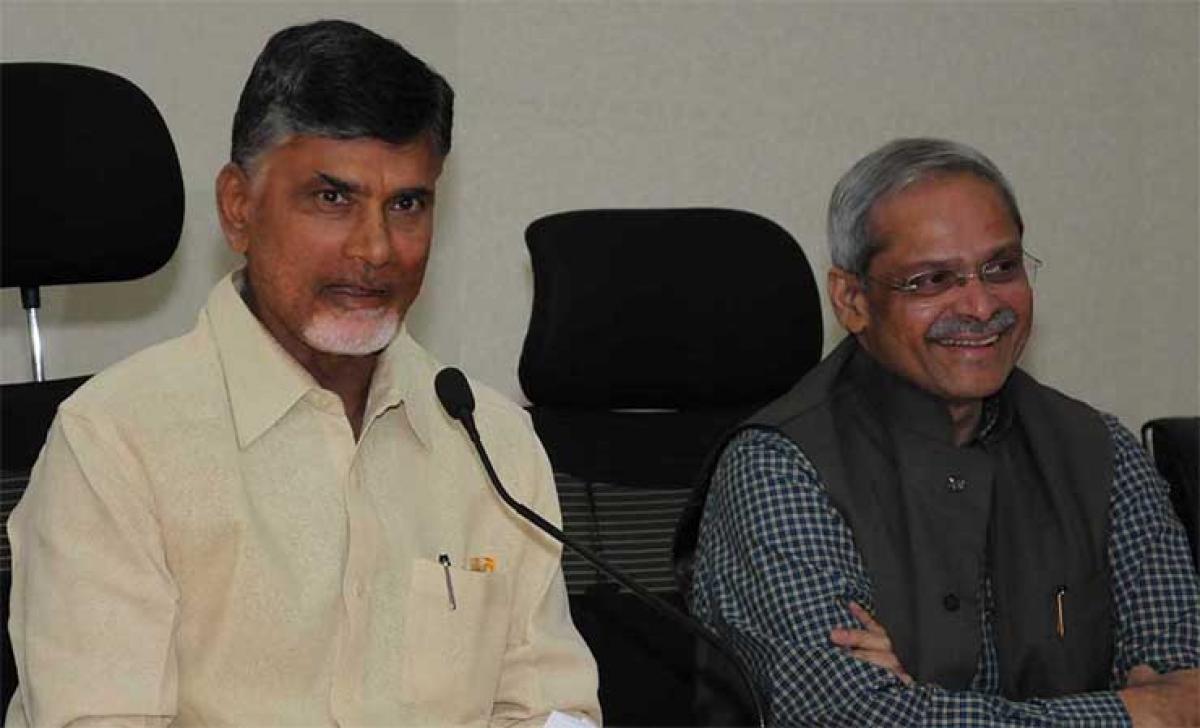 Chief Minister Nara Chandrababu Naidu along with Government  Adviser (communications) Parakala Prabhakar addressing the media in Vijayawada on Thursday