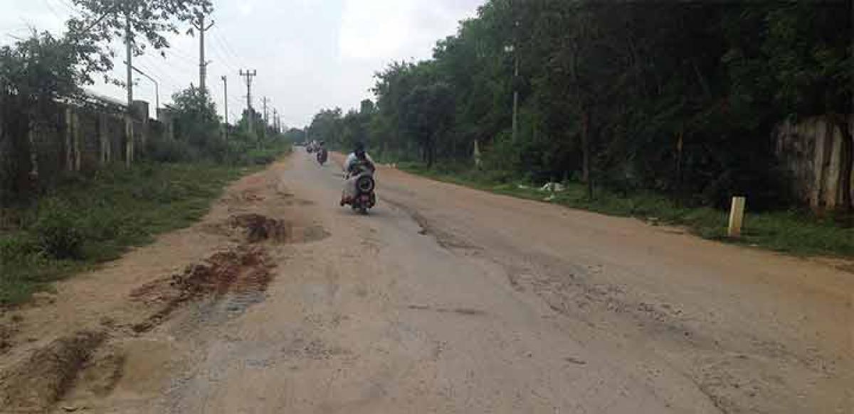 Bad road from Cherlapally  via Rampally lake leading to ORR needs to be relaid with CC or BT road