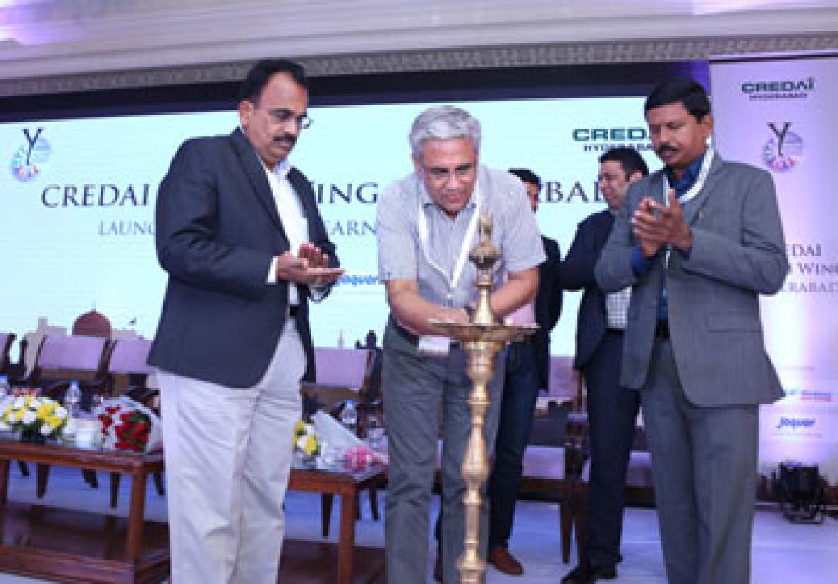 CRDA Commissioner N Srikanth and grandmaster Koneru Humpy at the property show 