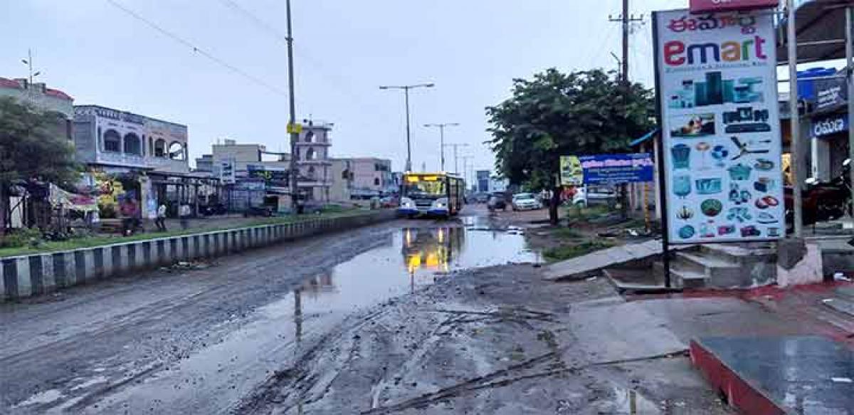 A main road aftar a spell of rain in Amaravati town in Guntur district