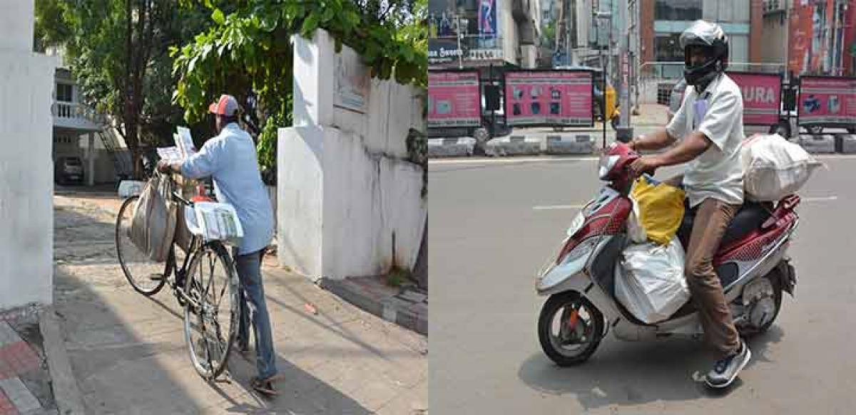 India Post personnel busy delivering parcels sent from various places to addressees in Hyderabad.  Photos: Ch Prabhu Das