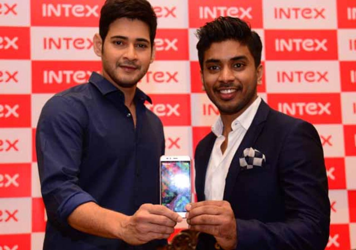 Film actor Mahesh Babu and Keshav Bansal, Director, Intex Technologies, launching Intex Aqua Trend smartphone in Hyderabad on Monday 