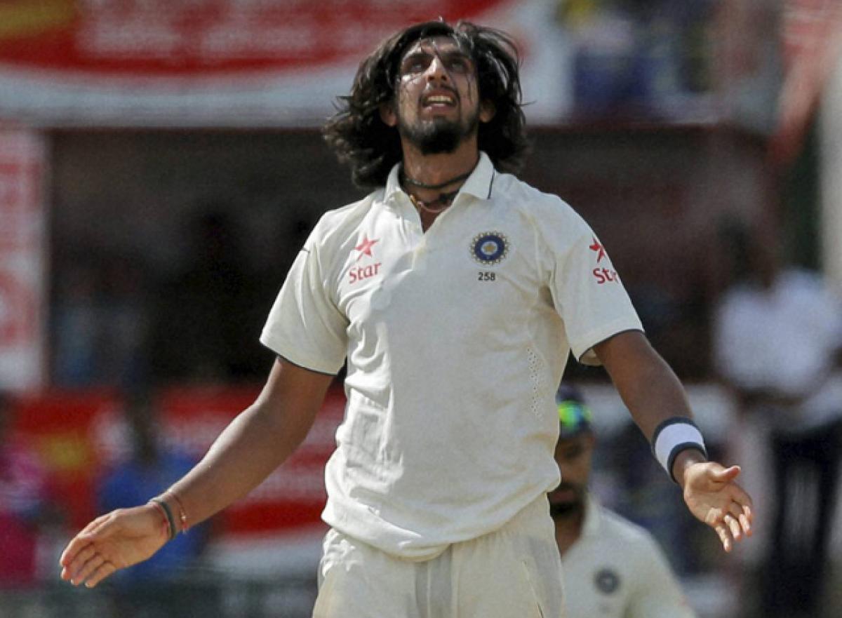 Ishant Sharma (5.54) reacts after taking the wicket of Sri Lanka's Rangana Herath on the third day of the third Test in Colombo on  Sunday