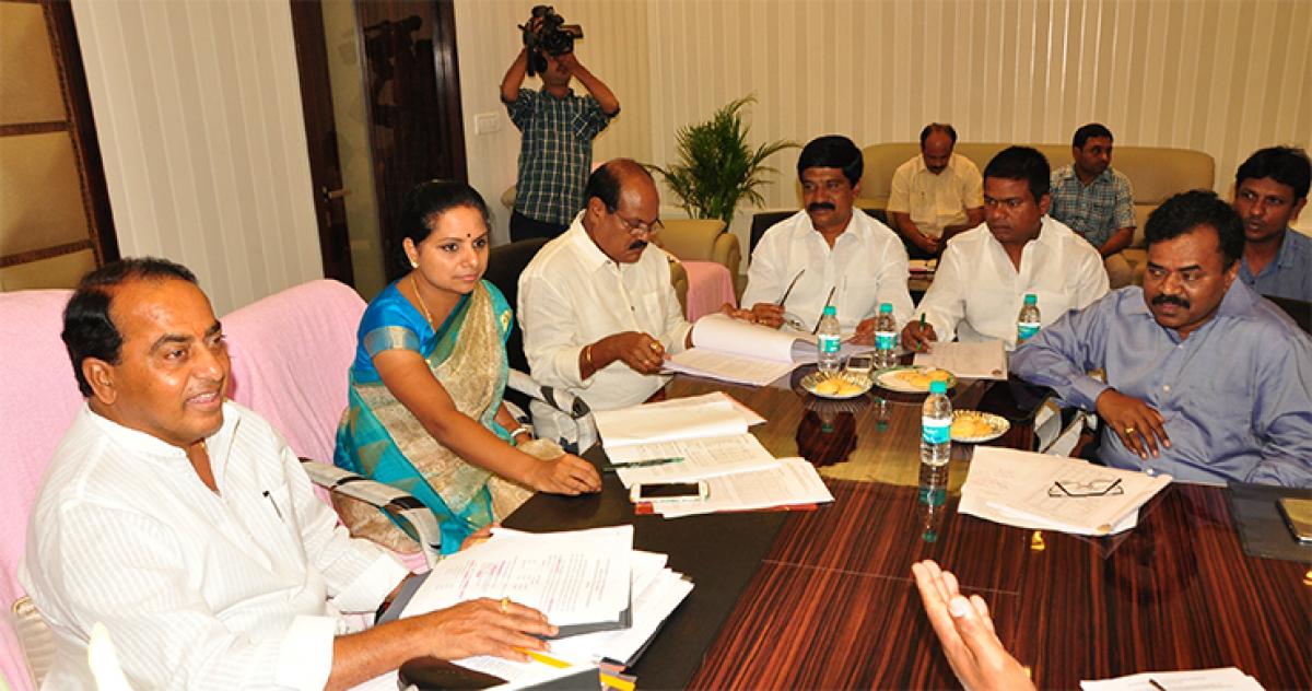 Housing and Endowment Minister Indrakaran Reddy holding a review meeting on housing and endowments works in Nizamabad district on Friday. Nizamabad MP K Kavitha is also seen