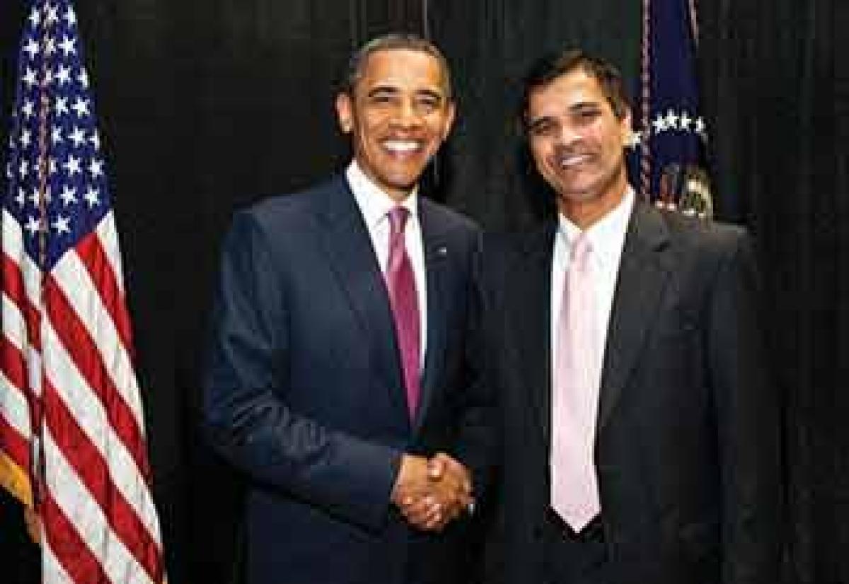 Sridhar Kota, Director, Institute for Manufacturing Leadership at University of Michigan seen with US President Barack Obama 