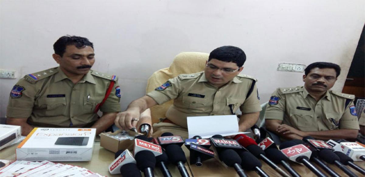 LB Nagar DCP Tasfeer Iqbal addressing the media after the arrest of a person in connection with an online fraud on Friday