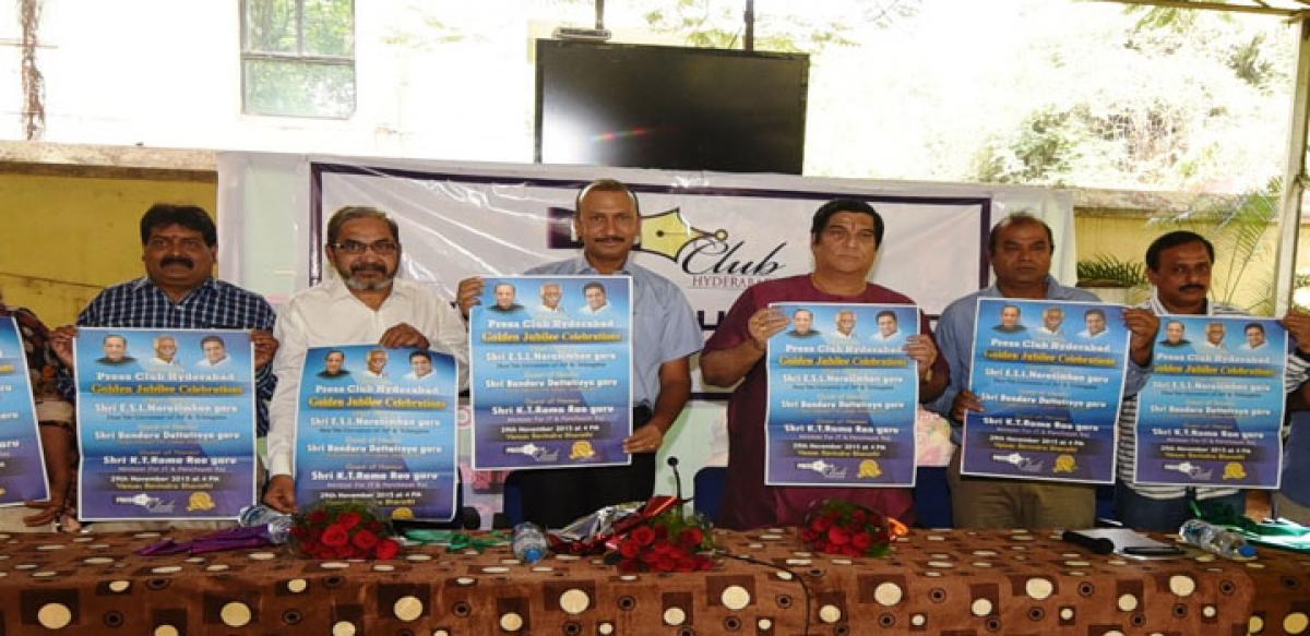 I&PR Commissioner Navin Mittal (third from left) and Media Advisor to Government KV Ramana Chary (centre) releasing a poster on Thursday  