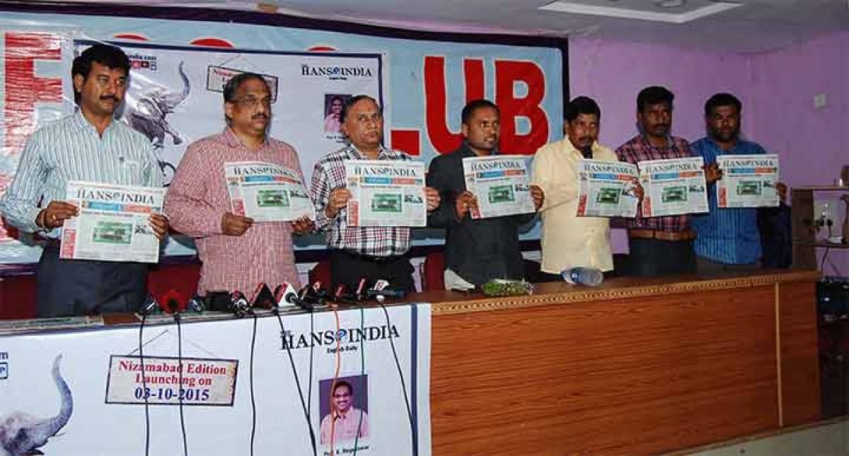 The Hans India Editor Prof K Nageshwar (second from left), Hyderabad Media House Limited Executive Director K Hanumanta Rao (third from left) and others launching The Hans India Nizamabad Edition in Nizamabad on Saturday