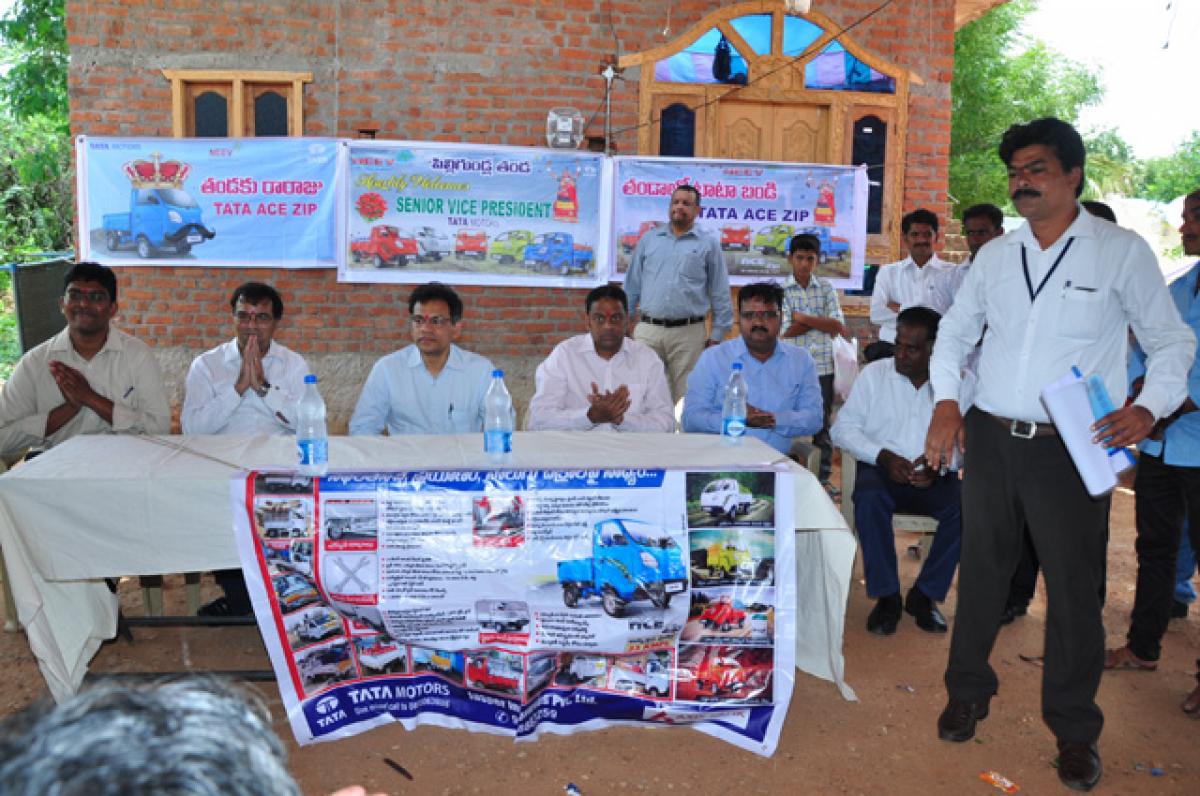 Tata Motors and Jasper Industries officials at Pilligundala Tanda, near Bhongir, on Sunday