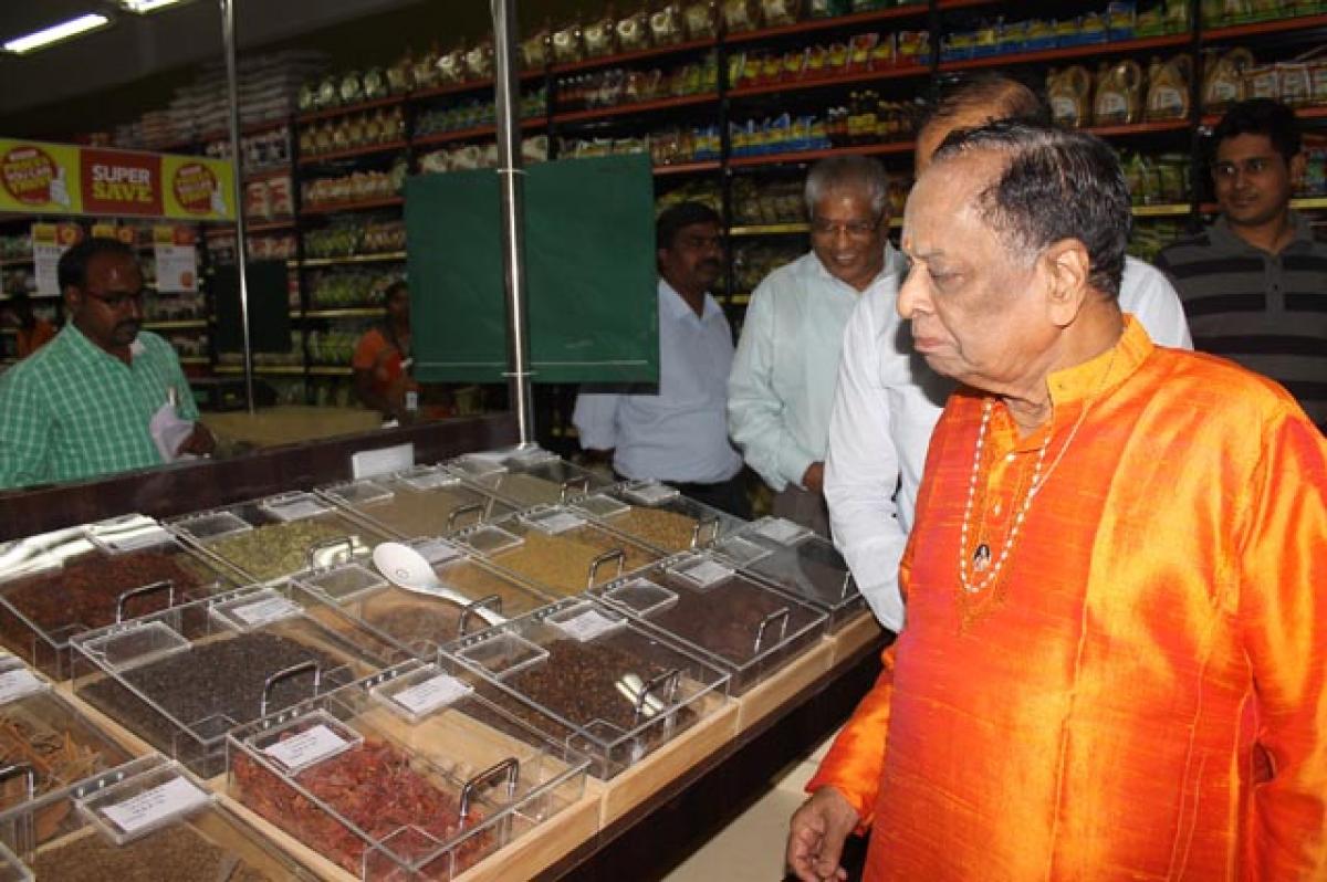 Renowned musician Dr Malamuralikrishna checking the products on display after inaugurating Spencer&rsquo;s hyper market at L B Nagar in Hyderabad on Wednesday