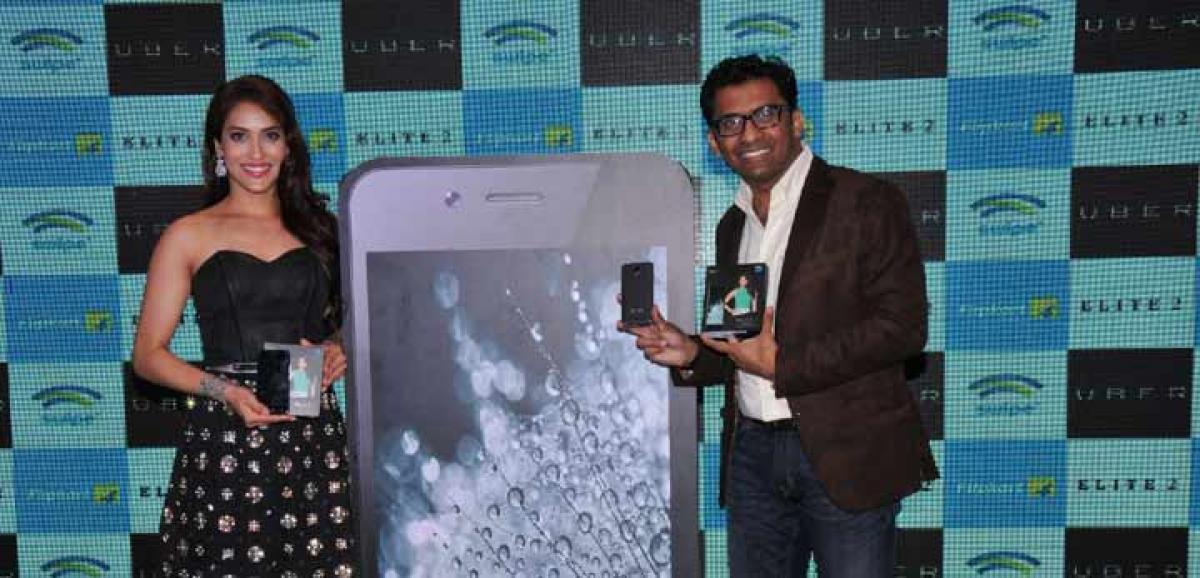 Rashmi Nigam, film actress, and Shripal Gandhi, Founding CEO, Swipe Technologies, at the launch of Elite 2 smartphone in Hyderabad on Wednesday