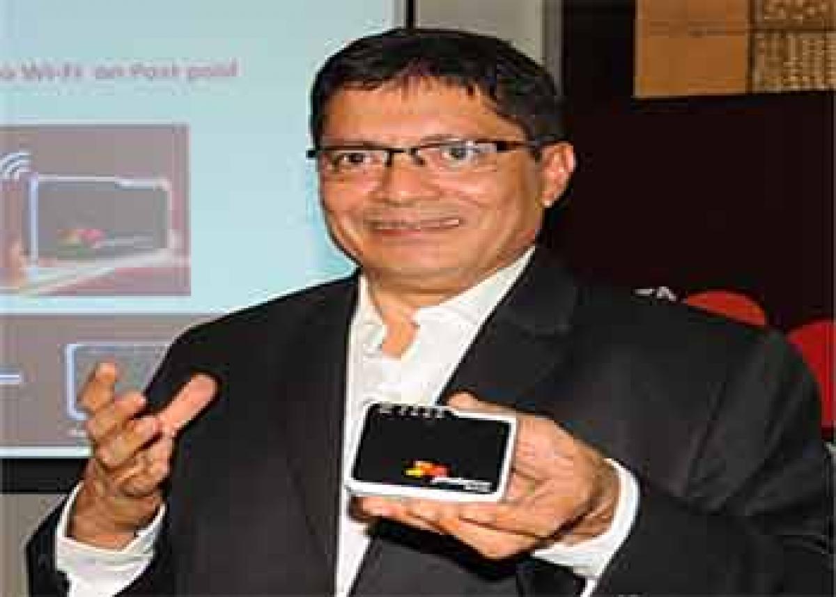 Sanjiva Jha, head of Mobility Business Unit of Tata Docomo AP and Telangana, addressing a press conference
