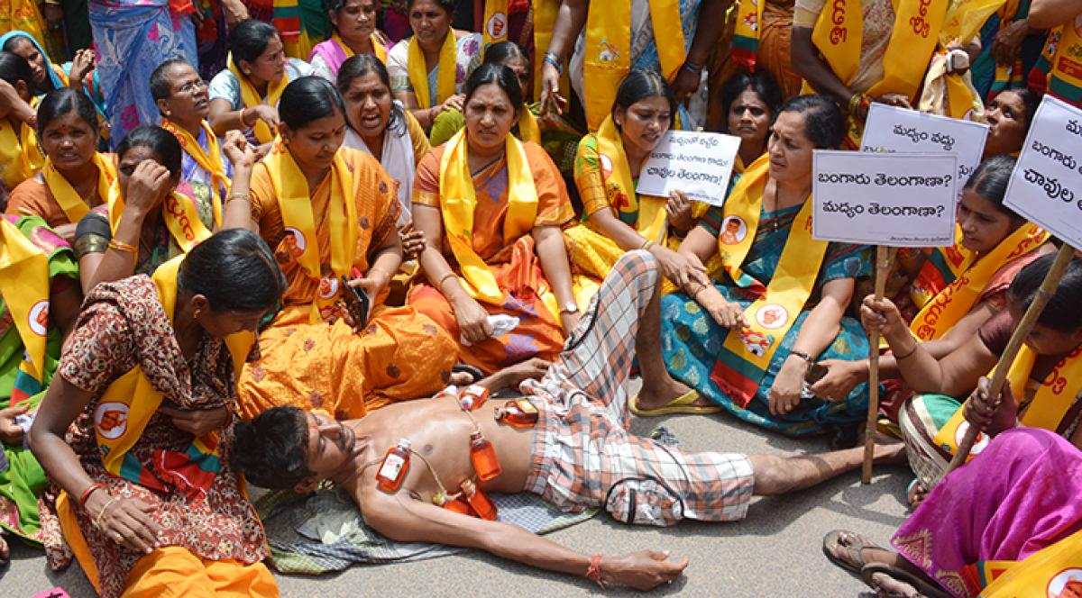 Members of Telugu Desam Mahila wing protesting against the government&rsquo;s cheap liquor policy, in Hyderabad on Monday.