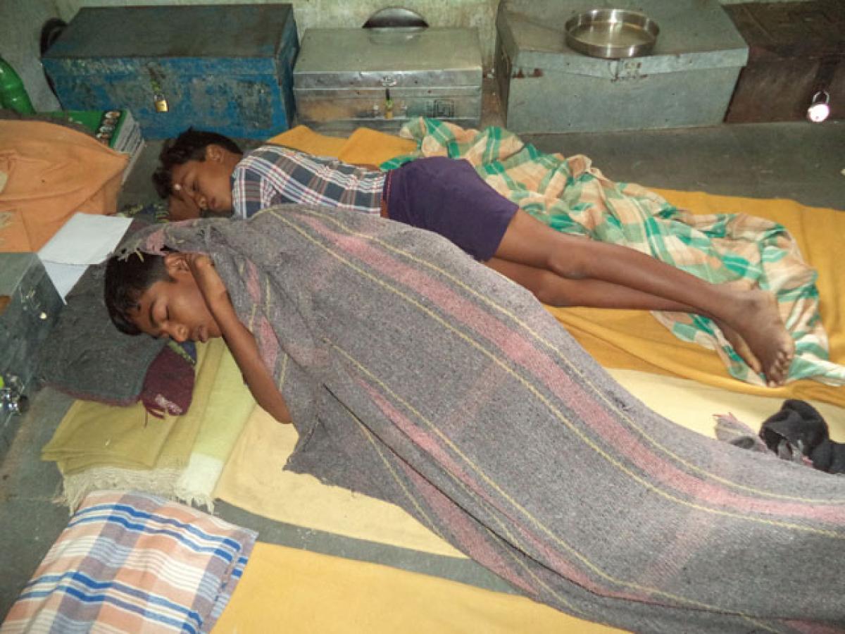 Two students are forced to sleep on the same bed at a government hostel in Adilabad