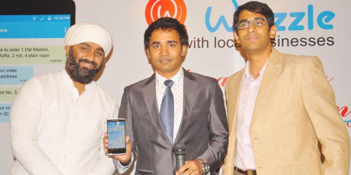 Gurmeet Singh of 13Dhaba, Hari Chava, CEO and Siddhartha Kongara, Technology Head, Whizzle Mobile App, at the launch of chat commerce app in Hyderabad on Wednesday