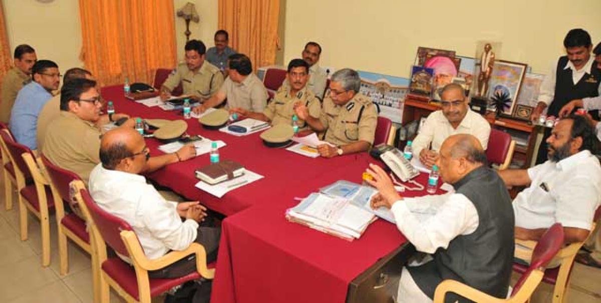 AP Legislative Council Chairman A Chakrapani holding a meeting with police officers over security during ensuing Assembly session at his chamber in AP Legislative Council on Sunday. DGP J V Ramudu and other officials are seen.