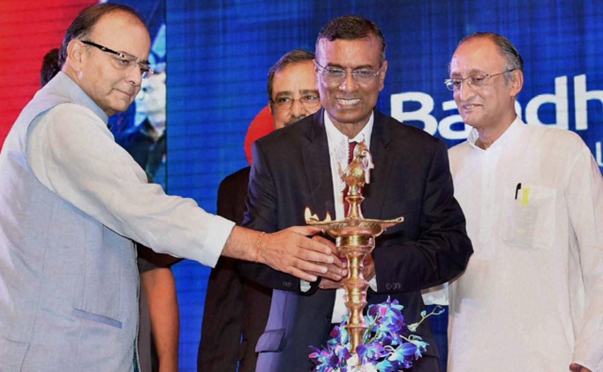 Union Finance Minister Arun Jaitley with  Chandra Shekhar Ghosh(centre) , Managing Director and CEO of Bandhan bank and West Bengal Finance Minister, Amit Mitra during the inauguration of Bandhan Bank in Kolkata on Sunday. PTI Photo