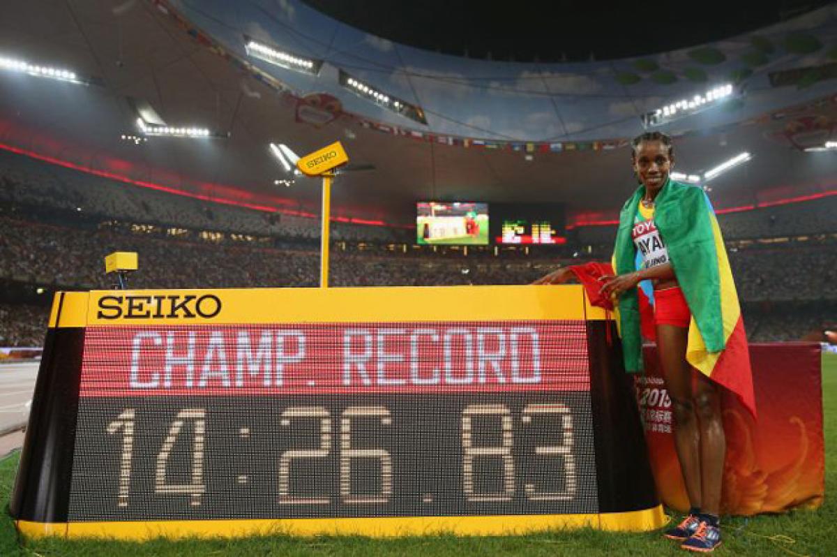 Almaz Ayana celebrates after inspiring amn Ethiopian sweep with a championship record in the women 5000 metres final on the final day of the World championships in Beijing on Sunday