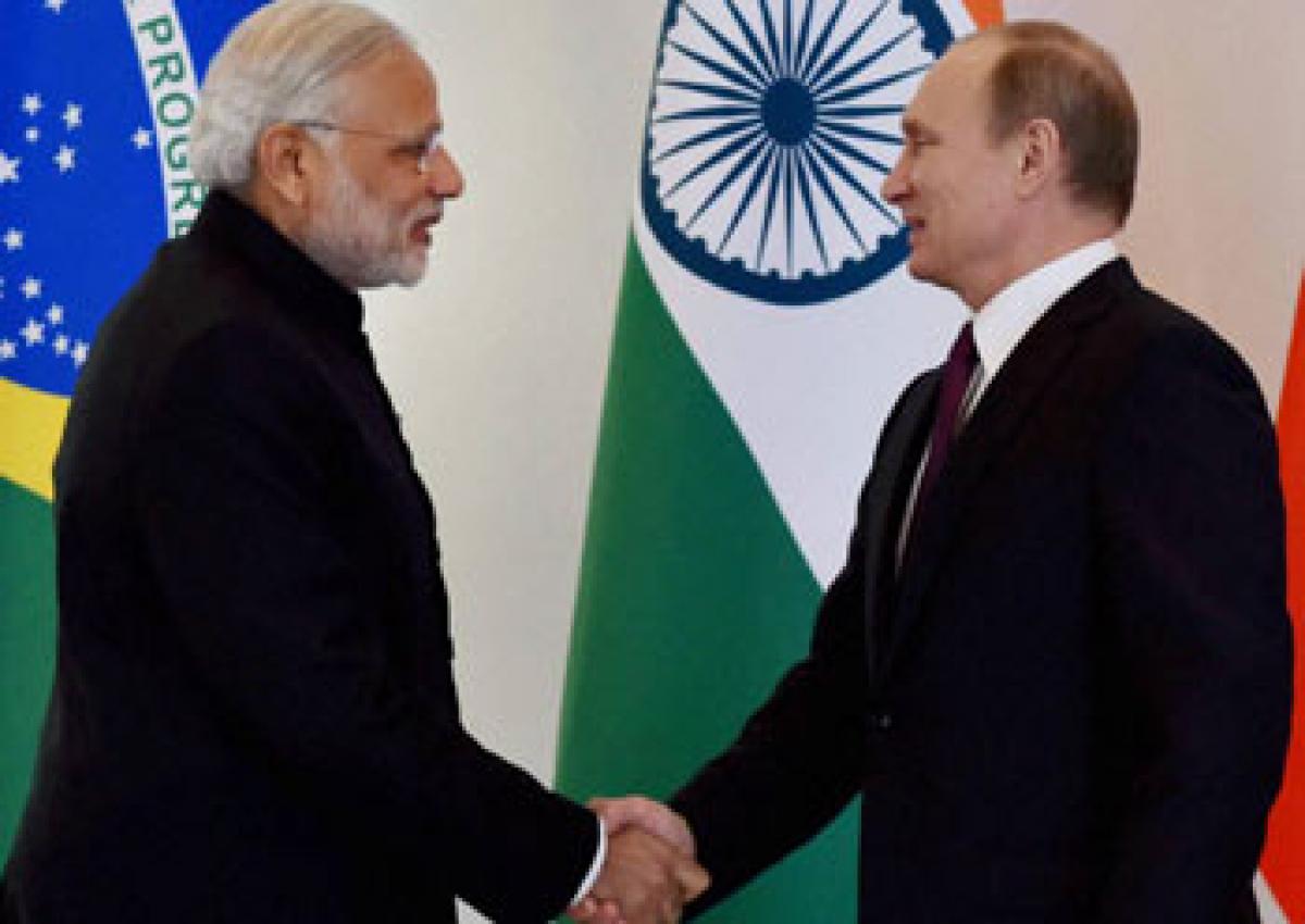 Prime Minister Narendra Modi shakes hand with Russian President Vladimir Putin before BRICS meeting in Antalya, Turkey on Sunday