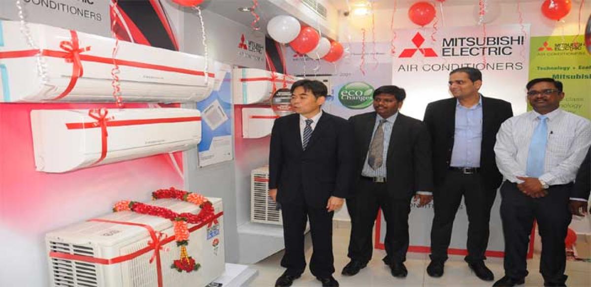Mitsubishi director and Business head of LE Division Takashi Nishikuma San (left)  and General Manager Neeraj Gupta San (right) inaugurating the  Mitsubishi electric air conditioners showroom in the city on  Monday Photo: Ch Venkata Mastan