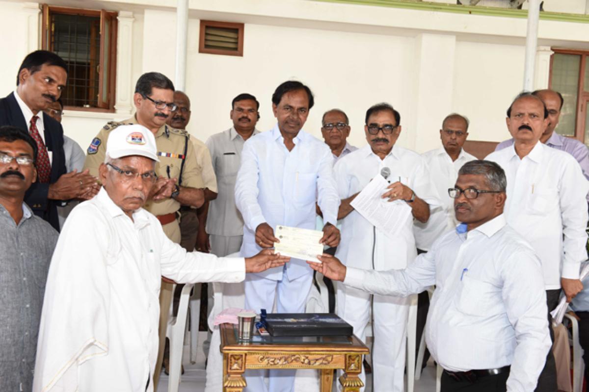 Ex-servicemen meeting Chief Minister K Chandrashekar Rao at his camp office on Thursday. Telangana DGP Anurag Sharma is also seen 