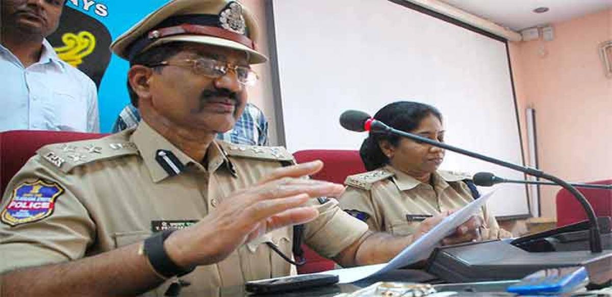 Joint Commissioner of Police T Prabhakar Rao addressing the media after the arrest of 2 Nigerians and 2 Indians for cheating innocent girls through fake online matrimonial ads, at Police Control Room, Nampally, in Hyderabad on Friday