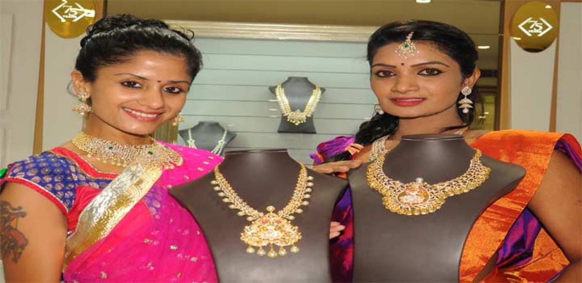 Models displaying the Lakshmi collection of diamond jewellery at Kirtilal Showroom in the city on Thursday Photo: Ch Venkata Mastan