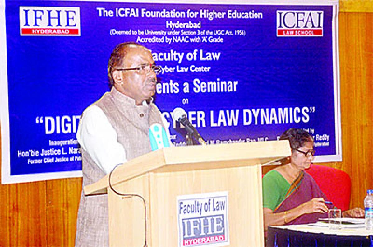Former Justice  L Narasimha Reddy addressing the gathering at the seminar