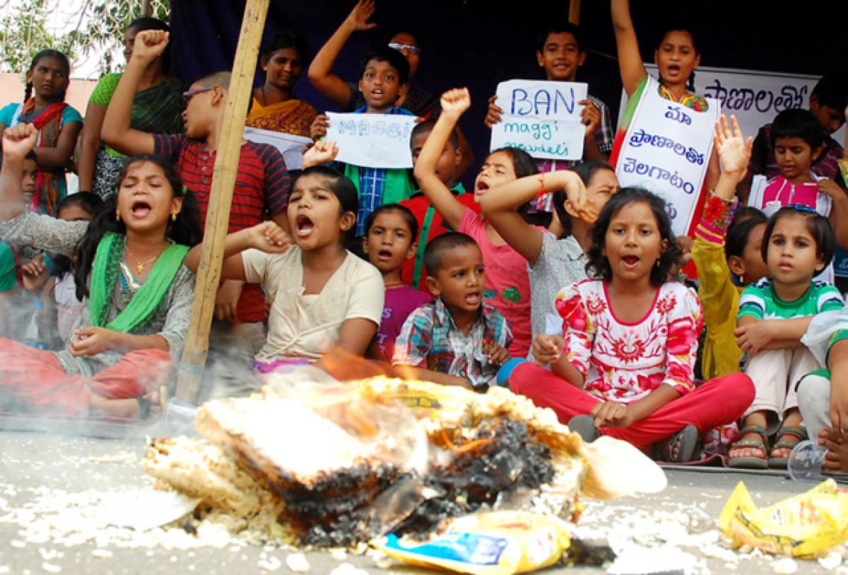 Children holding a protest against Maggi in the city on Friday