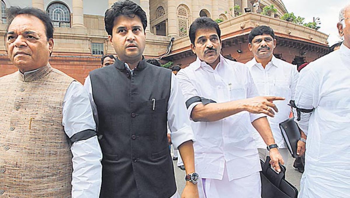 Cong leaders with black bands on their arms at Parliament house during the monsoon session in New Delhi (File photo)