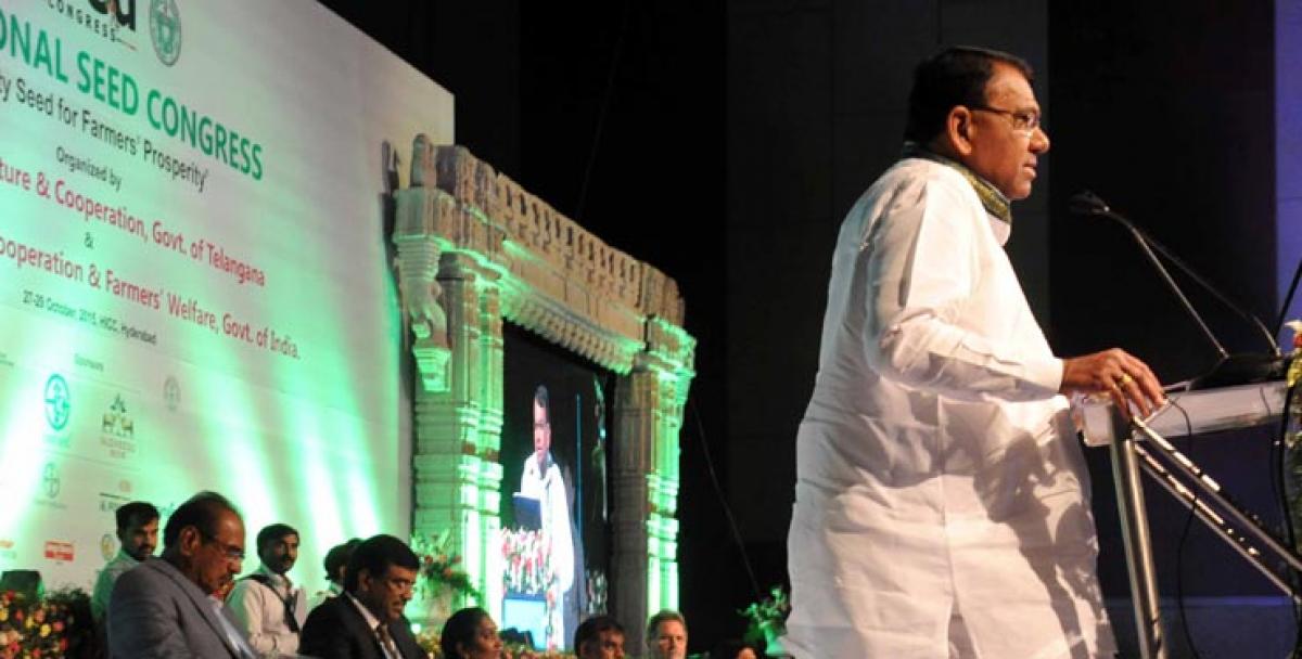 Agriculture Minister Pocharam Srinivas Reddy addressing the 8th National Seeds Congress at HICC in Hyderabad on Tuesday 
