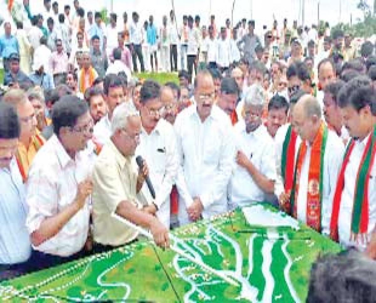 Health Minister Kamineni Srinivas (centre), Endowments Minister  P Manikyala Rao, BJP State President K Haribabu (right to Kamineni) interacting with people at the Thotapalli project on Sunday