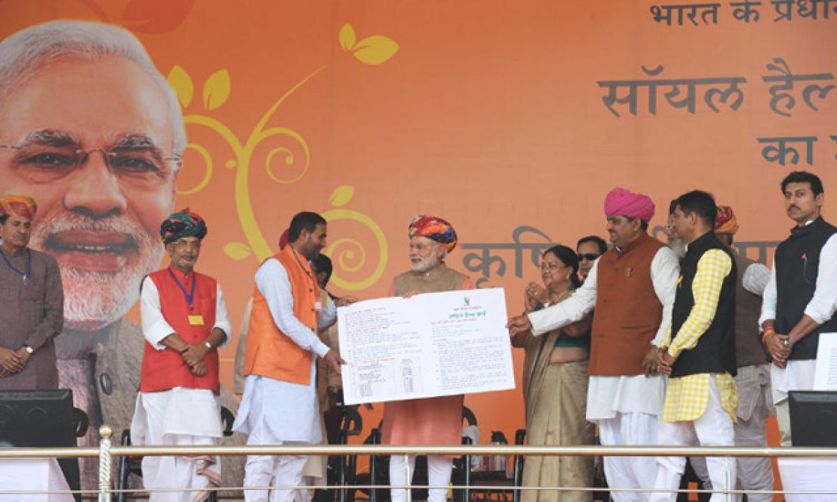 Prime Minister Narendra Modi at the launch of the ‘Soil Health Card Scheme’ at Suratgarh in Rajasthan on February 19, 2015