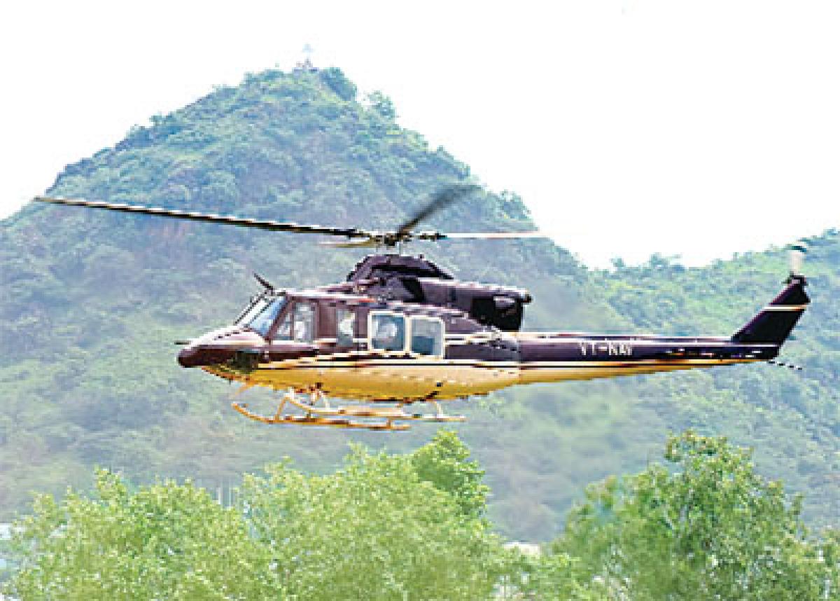 A helicopter on an aerial seeding sortie in Vijayawada on Friday