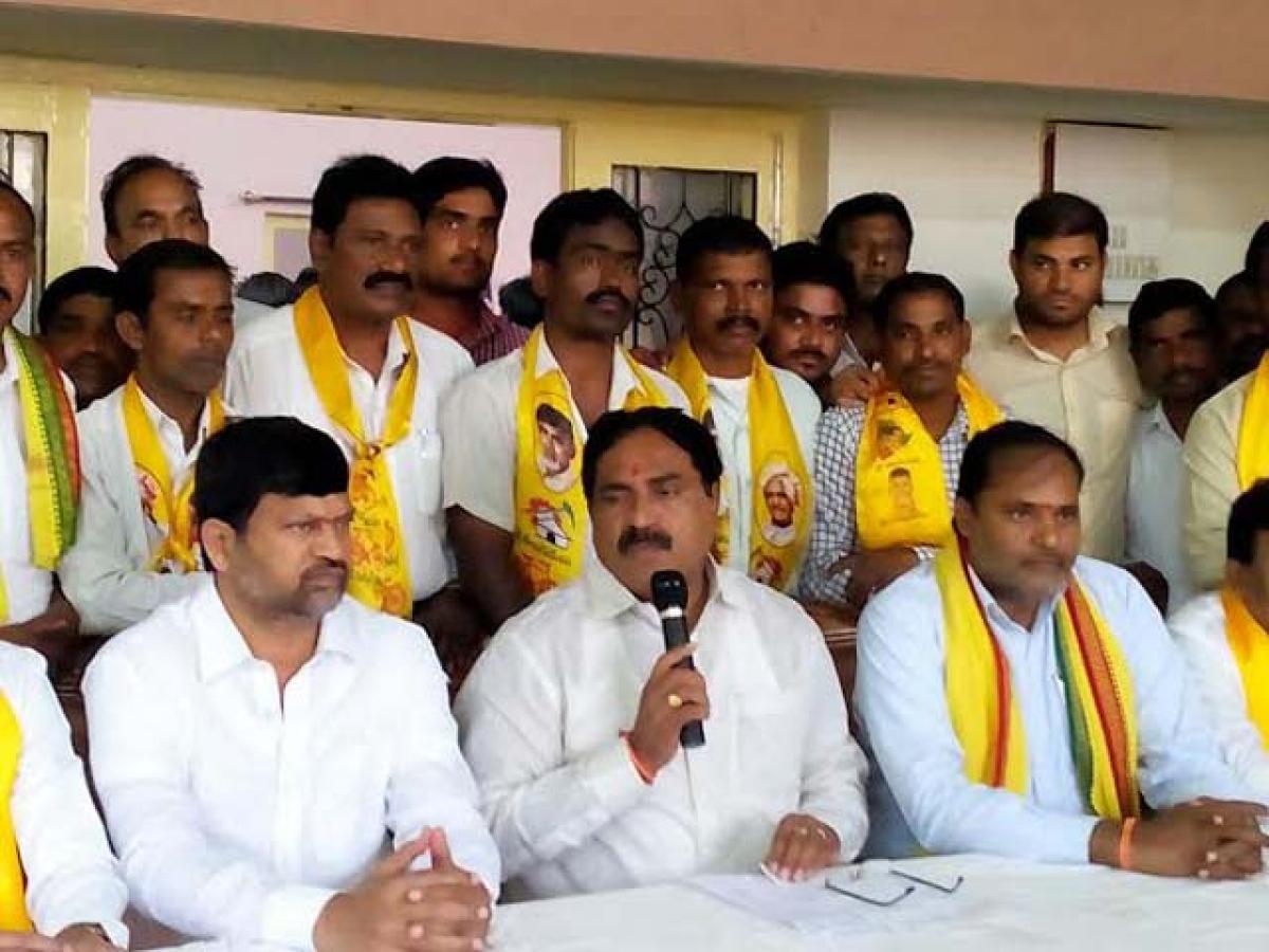 TDLP floor leader Yerrabelli Dayakar Rao addressing a media conference in Karimnagar on Sunday. TTDP state president L Ramana (first from left) also seen 