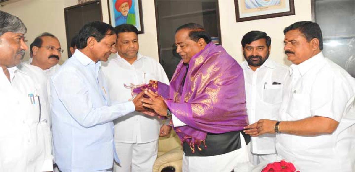 Chief Minister K Chandrashekar Rao greeting newly elected Deputy Chairman of Telangana Legislative Council N Vidyasagar Rao in Hyderabad on Tuesday