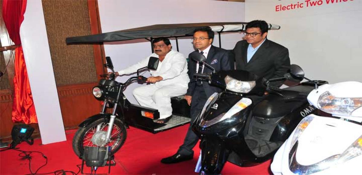 Transport Minister P Mahender Reddy checking an e-rickshaw in Hyderabad on Thursday. Ayush Lohia,  CEO, and Venugopal Rao N, Zonal Head, Lohia Auto, are also seen  