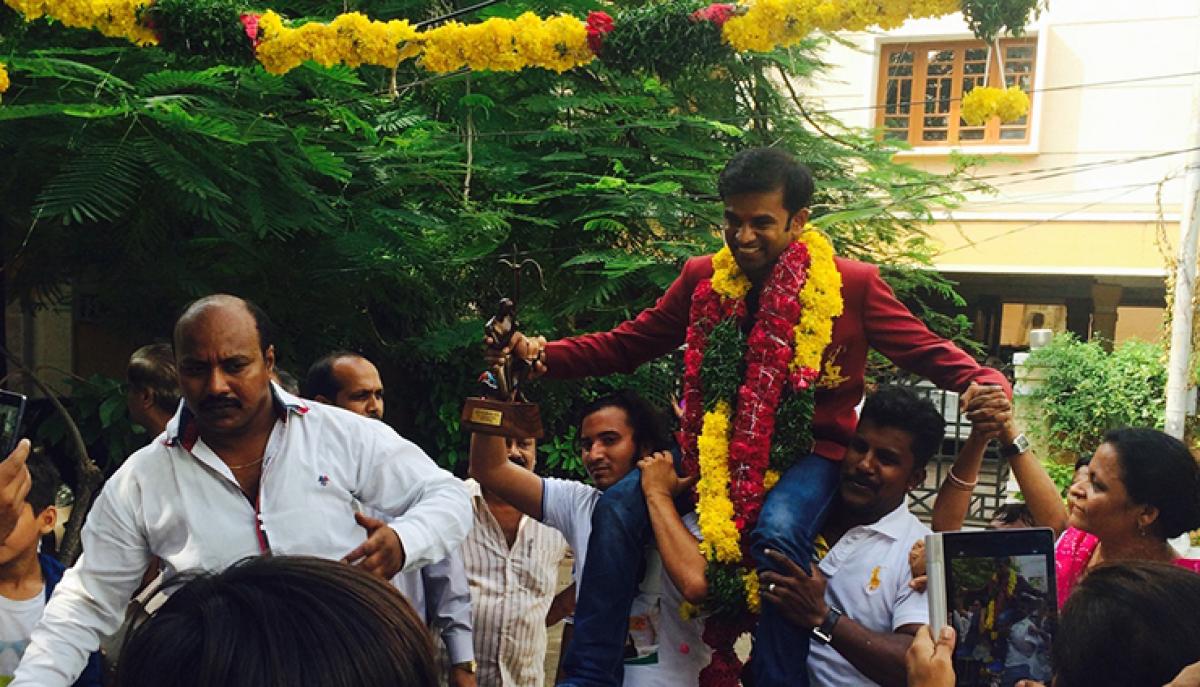 Anup Kumar Yama receives a grand reception on his arrival f rom New Delhi