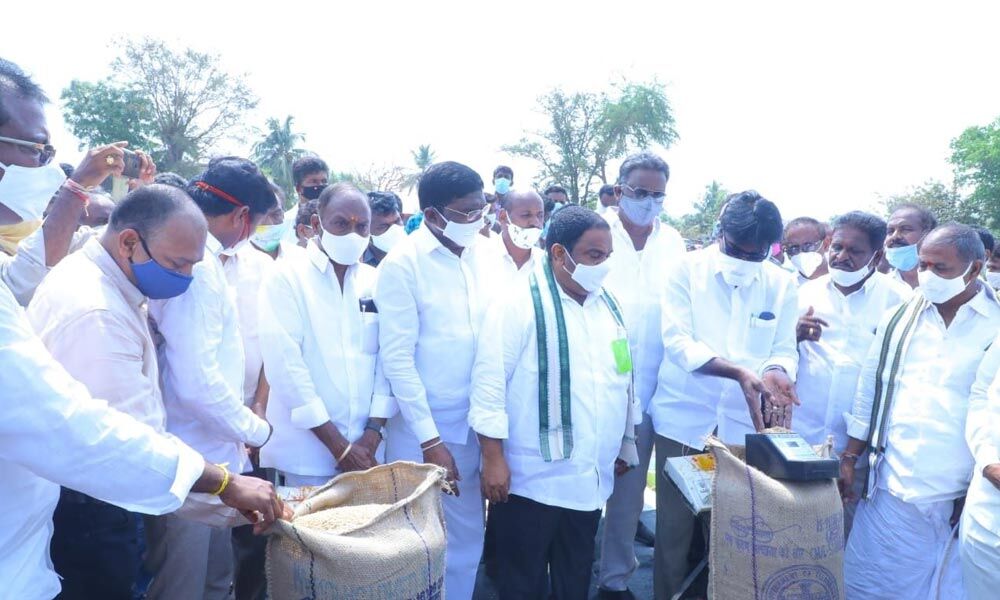 Transport Minister Puvvada Ajay launching paddy procurement centre at Lingala village in Kallur mandal in Khammam district on Tuesday
