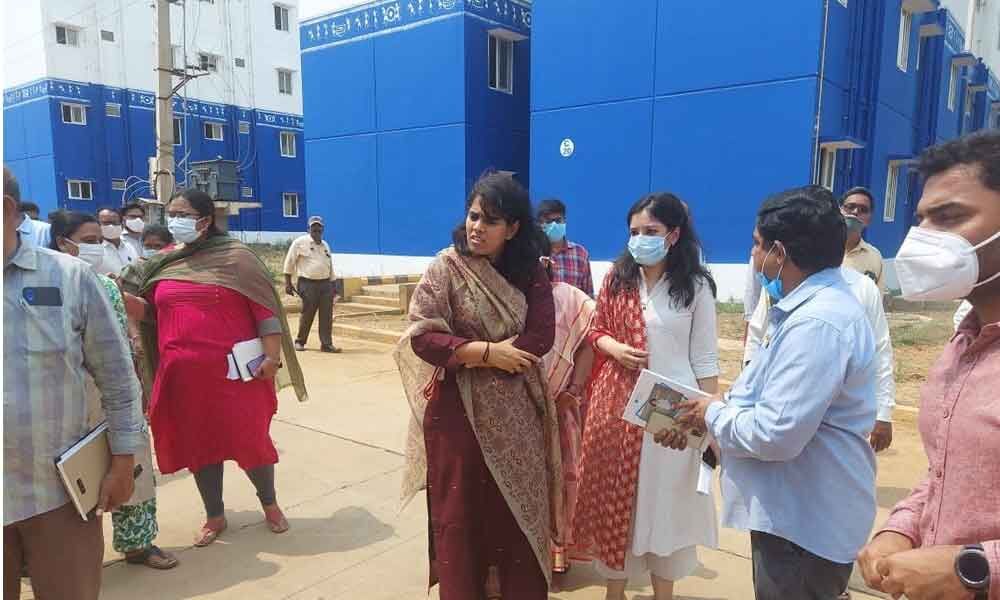 Joint Collector Keerthi Chekuri and Sub-Collector Anupama Anjali inspecting VAMBAY houses at Bommur on Friday Joint Collector Keerthi Chekuri and Sub-Collector Anupama Anjali inspecting VAMBAY houses at Bommur on Friday