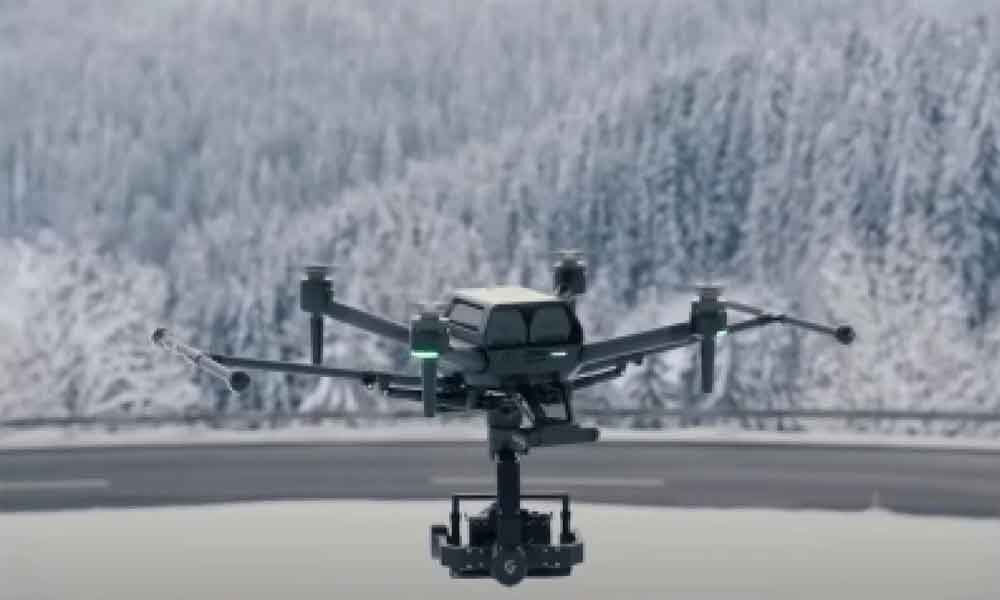 A drone that can change shape to fit package A drone that can change shape to fit package